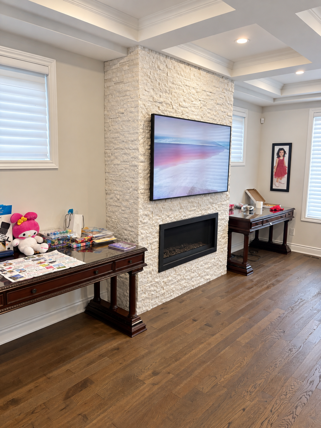 Family room with coffered ceiling and fireplace